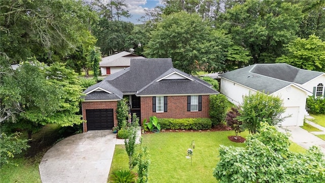 19 S Lake Dr, Savannah, GA 31410 - view of front of home featuring concrete driveway, an attached garage, a shingled roof, and a front lawn