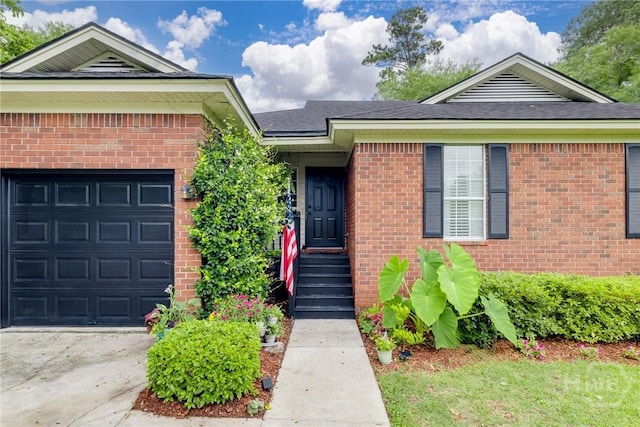 19 S Lake Dr, Savannah, GA 31410 - view of front of house with brick siding, concrete driveway, and a garage