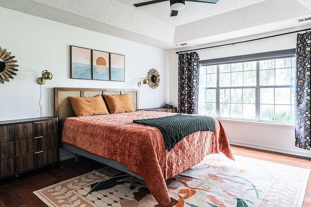 111 Runner Rd, Savannah, GA 31410 - bedroom featuring wood finished floors, a textured ceiling, and a ceiling fan