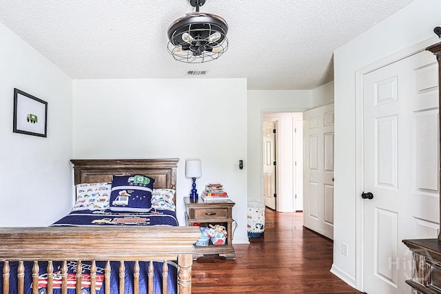 111 Runner Rd, Savannah, GA 31410 - bedroom with wood finished floors and a textured ceiling