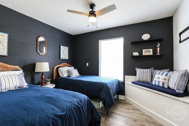 111 Runner Rd, Savannah, GA 31410 - bedroom featuring wood finished floors, a textured ceiling, baseboards, and ceiling fan