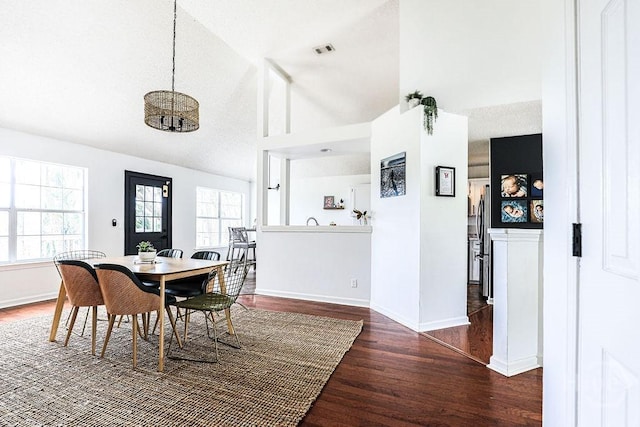 111 Runner Rd, Savannah, GA 31410 - dining area featuring wood finished floors, healthy amount of natural light, baseboards, and lofted ceiling
