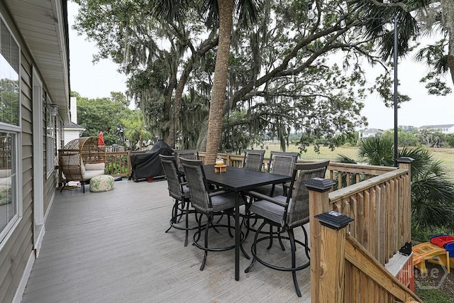 111 Runner Rd, Savannah, GA 31410 - wooden terrace with outdoor dining area