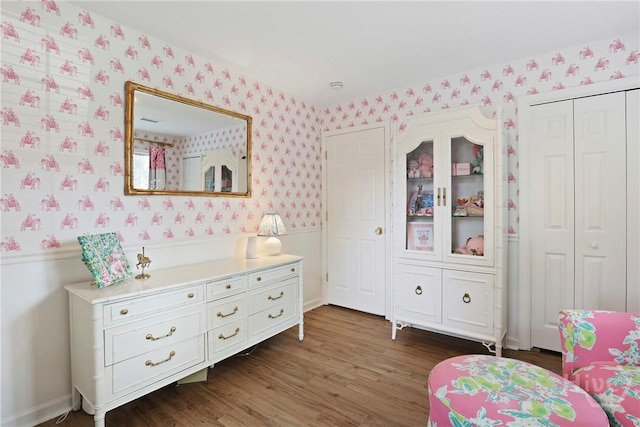 5109 Laroche Ave, Savannah, GA 31404 - bedroom featuring wallpapered walls, dark wood-type flooring, and wainscoting