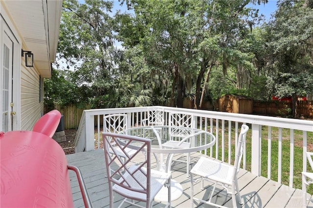 5109 Laroche Ave, Savannah, GA 31404 - wooden deck featuring outdoor dining area