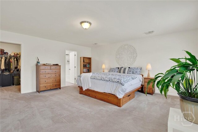 106 Tanzania Trl, Pooler, GA 31322 - carpeted bedroom with a walk in closet, baseboards, a closet, and connected bathroom