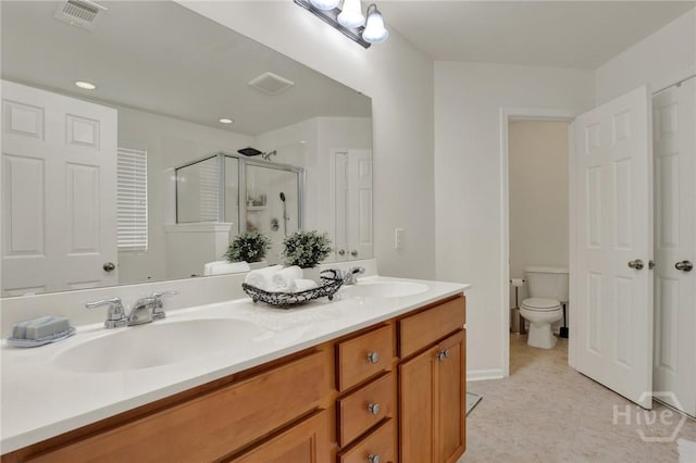 106 Tanzania Trl, Pooler, GA 31322 - full bathroom featuring double vanity, a shower stall, toilet, and recessed lighting