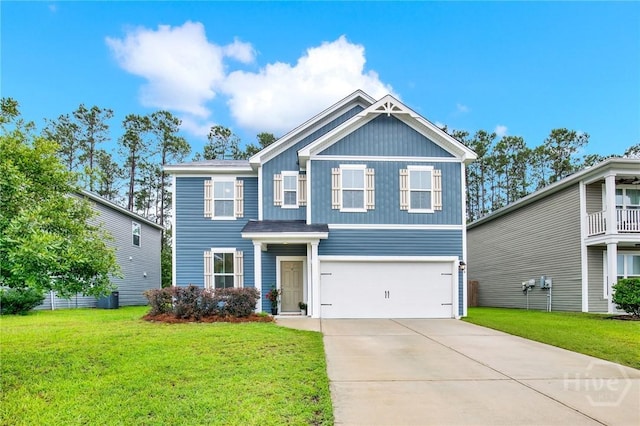 106 Tanzania Trl, Pooler, GA 31322 - view of front of property with a garage, concrete driveway, a front yard, and board and batten siding