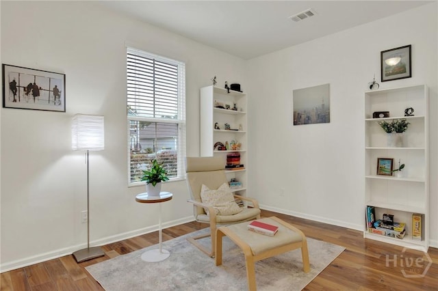 106 Tanzania Trl, Pooler, GA 31322 - living area featuring wood finished floors and baseboards