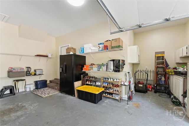 2 Dalry Ln, Savannah, GA 31419 - garage featuring black fridge