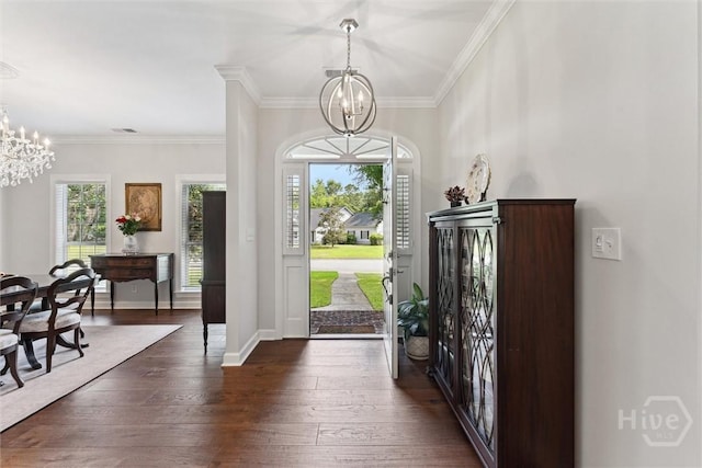 2 Dalry Ln, Savannah, GA 31419 - entrance foyer with a chandelier, dark wood-style flooring, ornamental molding, and baseboards