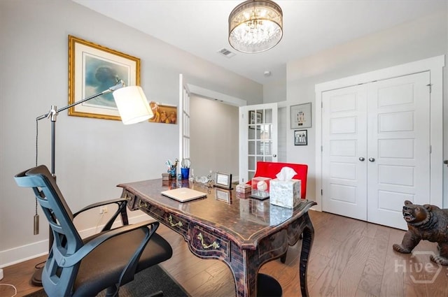 119 Danbury Ct, Pooler, GA 31322 - office area featuring wood finished floors, a chandelier, and baseboards