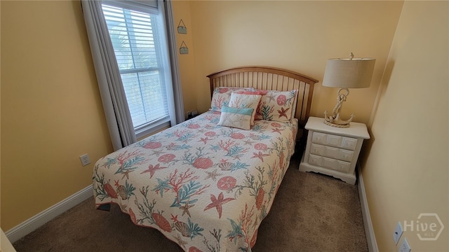 18 Silver Ave Unit 4, Tybee Island, GA 31328 - carpeted bedroom featuring baseboards
