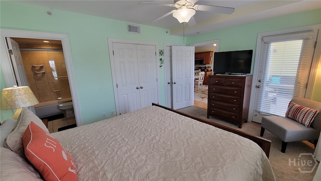 18 Silver Ave Unit 4, Tybee Island, GA 31328 - carpeted bedroom with a closet, ceiling fan, and ensuite bathroom
