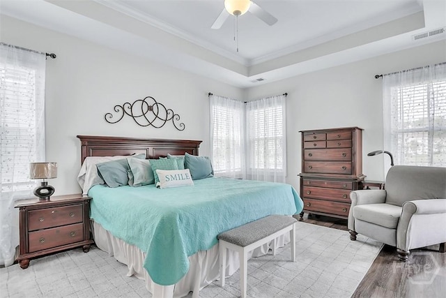 214 Park Chase Chase, Pooler, GA 31322 - bedroom with a tray ceiling, multiple windows, ornamental molding, light floors, and a ceiling fan