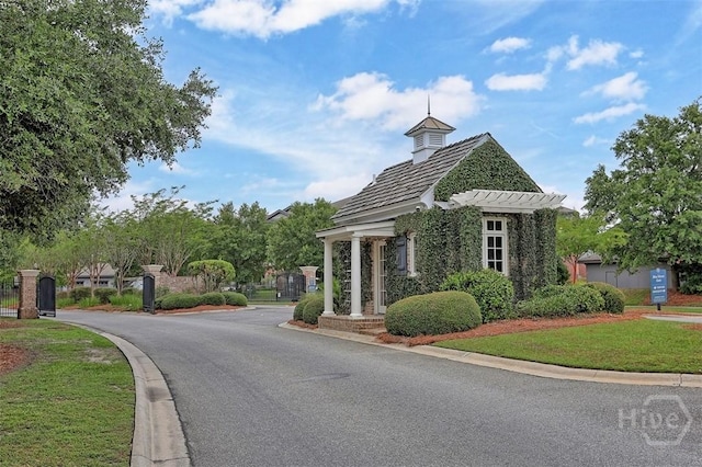 214 Park Chase Chase, Pooler, GA 31322 - view of asphalt road with curbs and a gated entry
