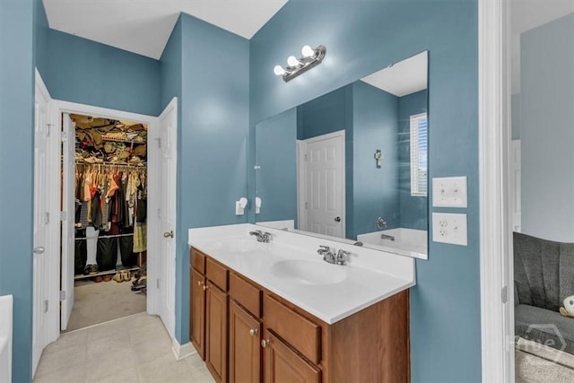 413 Lions Den Dr, Pooler, GA 31322 - bathroom featuring double vanity and a walk in closet