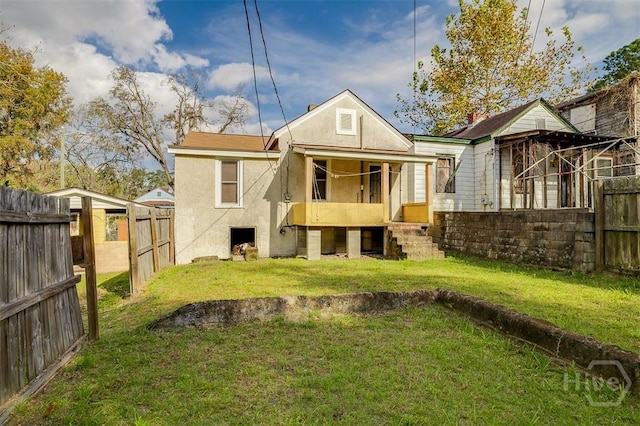1023 W 37th St, Savannah, GA 31415 - rear view of property with stucco siding