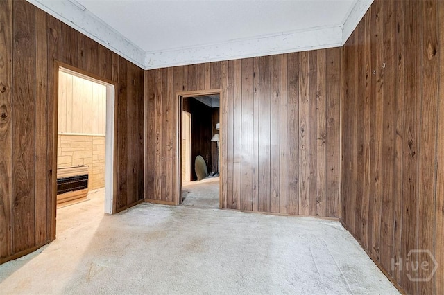1023 W 37th St, Savannah, GA 31415 - unfurnished room featuring carpet flooring, wooden walls, crown molding, and heating unit