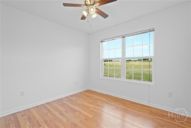 315 S Bridgeport Dr, Statesboro, GA 30461 - unfurnished room with baseboards, light wood finished floors, and ceiling fan