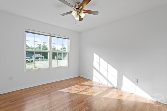 315 S Bridgeport Dr, Statesboro, GA 30461 - spare room with wood finished floors, baseboards, and ceiling fan