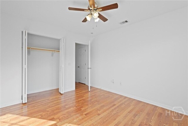 315 S Bridgeport Dr, Statesboro, GA 30461 - unfurnished bedroom with light wood-style floors, a closet, baseboards, and ceiling fan
