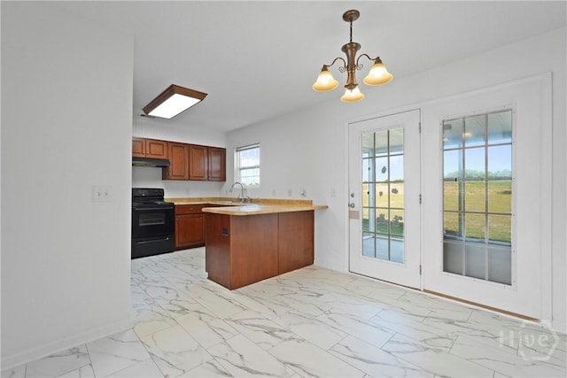 315 S Bridgeport Dr, Statesboro, GA 30461 - kitchen with black / electric stove, under cabinet range hood, light marble finish flooring, a sink, and light countertops