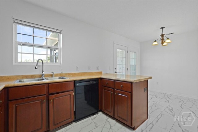 315 S Bridgeport Dr, Statesboro, GA 30461 - kitchen with black dishwasher, a sink, light marble finish flooring, and a chandelier