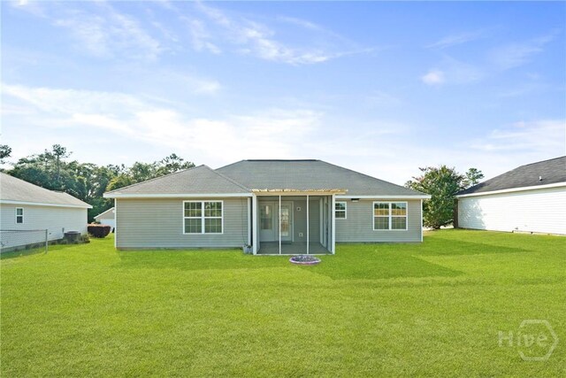 315 S Bridgeport Dr, Statesboro, GA 30461 - rear view of property featuring a lawn and a sunroom
