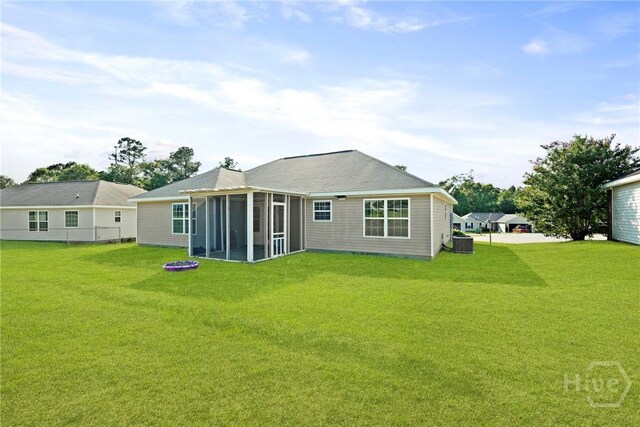 315 S Bridgeport Dr, Statesboro, GA 30461 - rear view of house featuring central AC unit and a sunroom