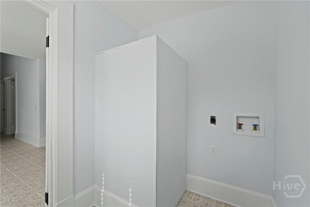 710 W 36th St, Savannah, GA 31415 - laundry room featuring hookup for a washing machine, electric dryer hookup, baseboards, and light tile patterned floors