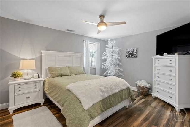 4000 Old River Rd S, Brooklet, GA 30415 - bedroom with dark wood-style floors, baseboards, and ceiling fan
