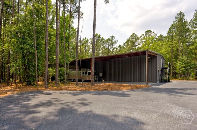 4000 Old River Rd S, Brooklet, GA 30415 - view of pole building with a wooded view