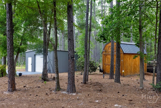 4000 Old River Rd S, Brooklet, GA 30415 - view of yard featuring a detached garage