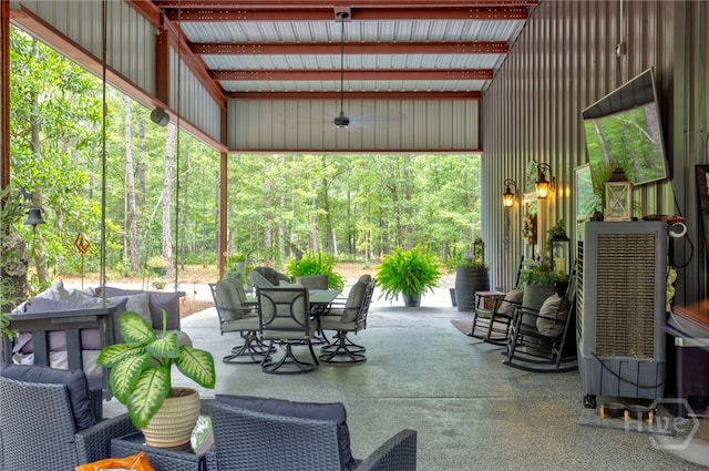 4000 Old River Rd S, Brooklet, GA 30415 - view of patio featuring outdoor dining space and a forest view