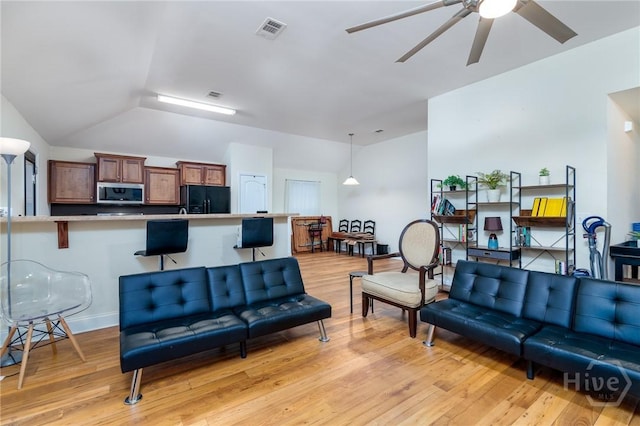 157 Stonebrook Way, Statesboro, GA 30458 - living room with a ceiling fan, light wood finished floors, and baseboards