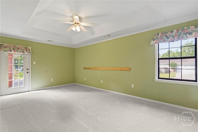 145 Cardinal Rd, Savannah, GA 31406 - spare room with a tray ceiling, carpet, ceiling fan, baseboards, and ornamental molding