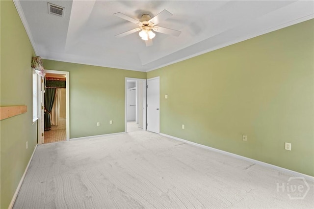 145 Cardinal Rd, Savannah, GA 31406 - unfurnished bedroom featuring a walk in closet, carpet floors, ornamental molding, baseboards, and ensuite bathroom