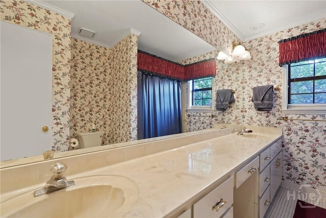 145 Cardinal Rd, Savannah, GA 31406 - bathroom with ornamental molding, wallpapered walls, double vanity, toilet, and tile patterned flooring