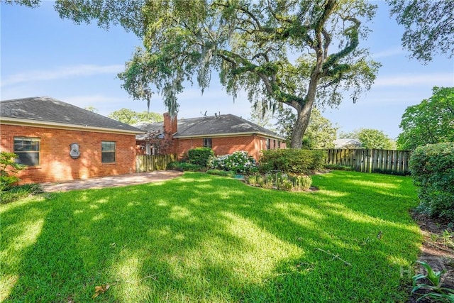 145 Cardinal Rd, Savannah, GA 31406 - view of yard featuring a patio