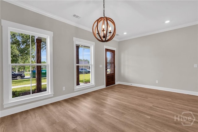 1362 Ebenezer Rd, Rincon, GA 31326 - empty room with a chandelier, baseboards, wood finished floors, ornamental molding, and recessed lighting