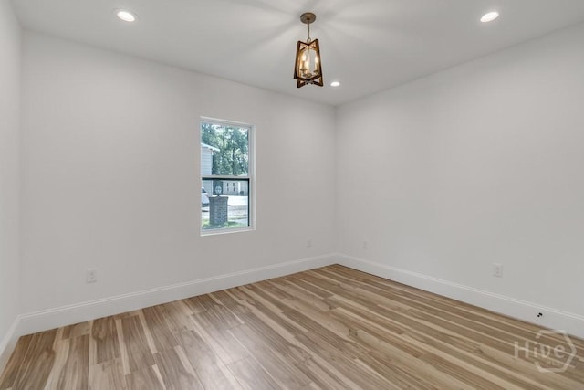 238-A W Magnolia Ave, Savannah, GA 31419 - unfurnished room featuring a chandelier, baseboards, light wood finished floors, and recessed lighting