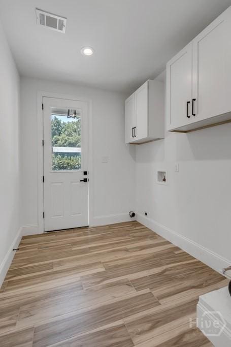 238-A W Magnolia Ave, Savannah, GA 31419 - washroom with cabinet space, baseboards, hookup for a washing machine, light wood-type flooring, and recessed lighting