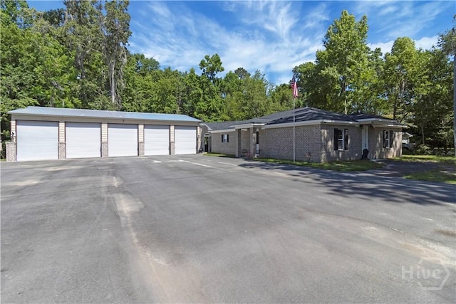 238-A W Magnolia Ave, Savannah, GA 31419 - view of front of house with brick siding and view of scattered trees