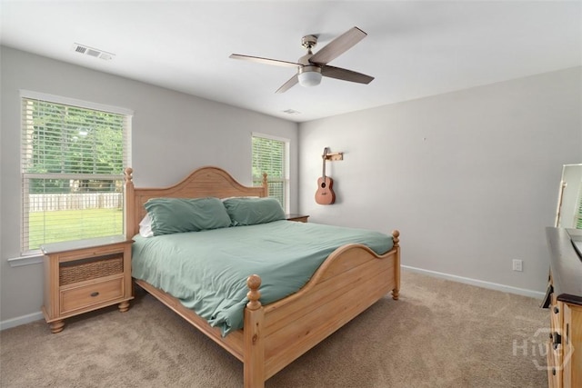 304 Boomer Ct, Guyton, GA 31312 - bedroom with light carpet, baseboards, and ceiling fan