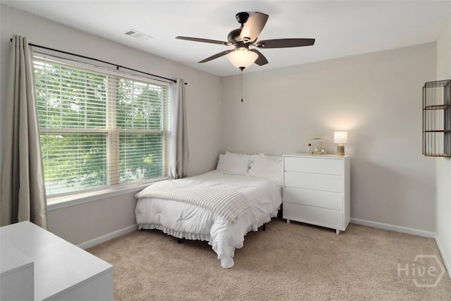304 Boomer Ct, Guyton, GA 31312 - bedroom featuring baseboards, light colored carpet, and a ceiling fan