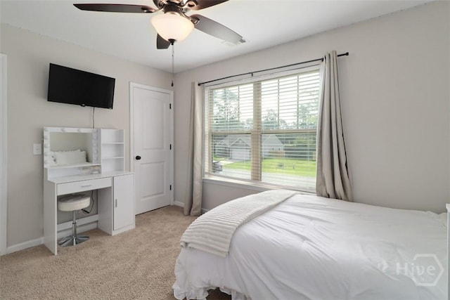 304 Boomer Ct, Guyton, GA 31312 - bedroom featuring light carpet, baseboards, and a ceiling fan