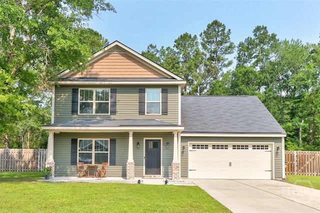 304 Boomer Ct, Guyton, GA 31312 - craftsman-style house featuring covered porch, driveway, and a garage