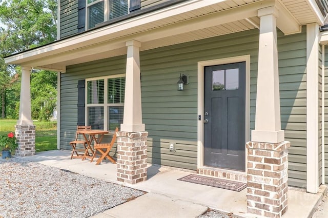 304 Boomer Ct, Guyton, GA 31312 - property entrance with a porch