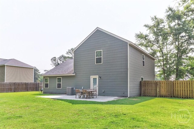 304 Boomer Ct, Guyton, GA 31312 - back of house with central air condition unit and a patio